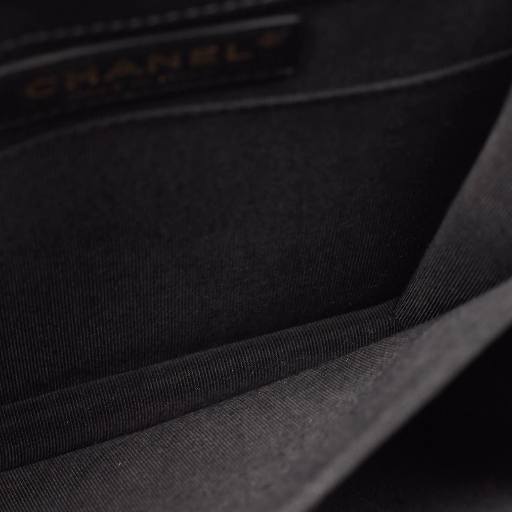 CHANEL Black Quilted Leather North South Boy Bag
